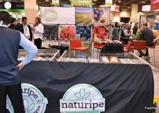 Overview of the booth of Naturipe Farms.